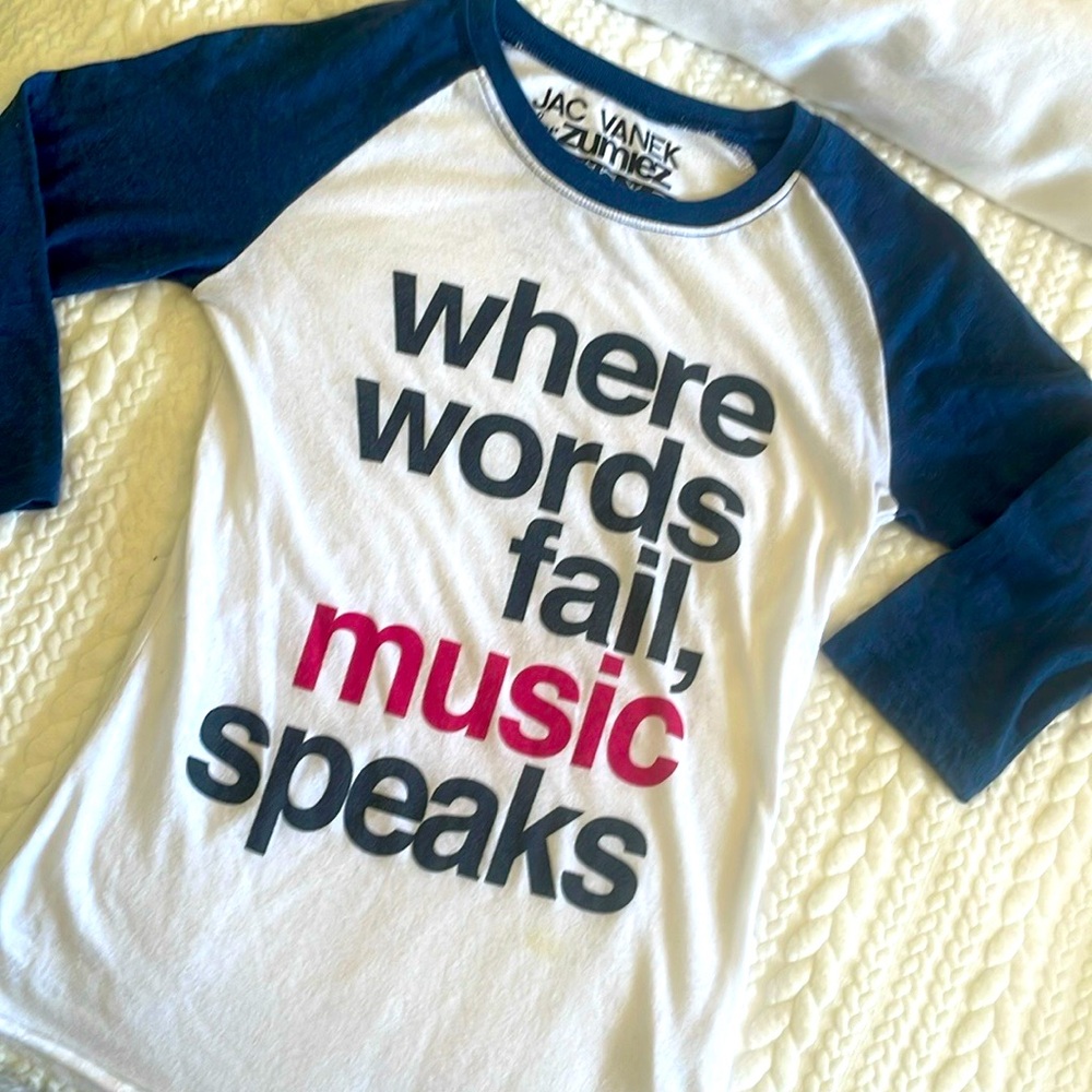 Jac Vanek for Zumiez graphic baseball tee “where words fail music speaks”
